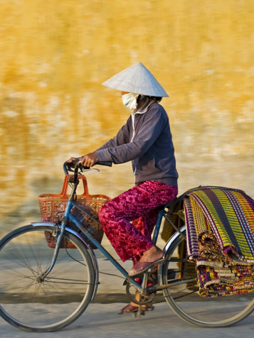 Vietnam - vietnam_befolkning_kvinde_cykel_02