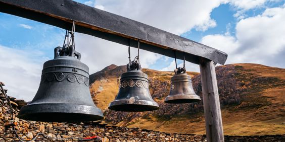 Georgia Upper Svaneti Ushguli Village Three Iron Bells Outside Lamaria Church