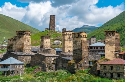 Georgia Ushguli Village At Foot Of Mt Shkhara Rock Towers